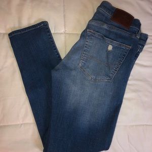 Medium wash distress jeans
